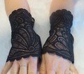 Black cuffs made of elastic lace 17 cm long size L